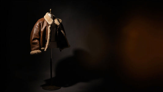 premium shearling leather jacket on mannequin under moody studio lighting