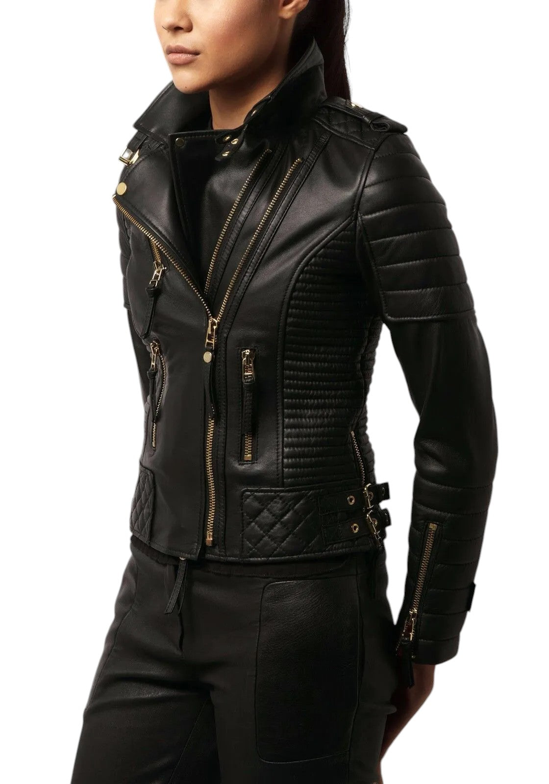 Front view of woman wearing a black quilted lambskin leather biker jacket with gold zippers and structured panels