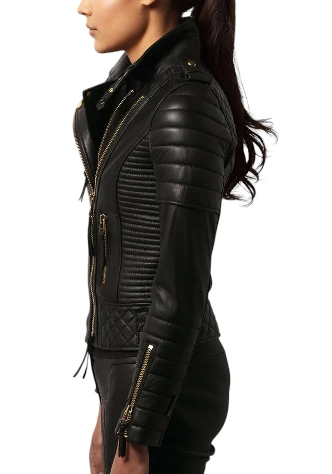 Front view of woman wearing a black quilted lambskin leather biker jacket with gold zippers and structured panels