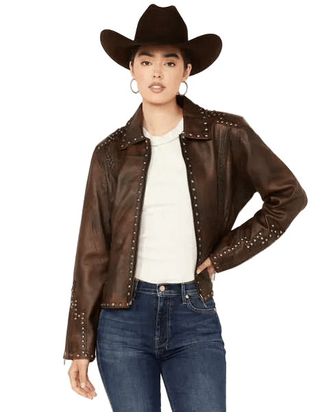 Person wearing a brown leather jacket with studs, white shirt, and blue jeans on a white background