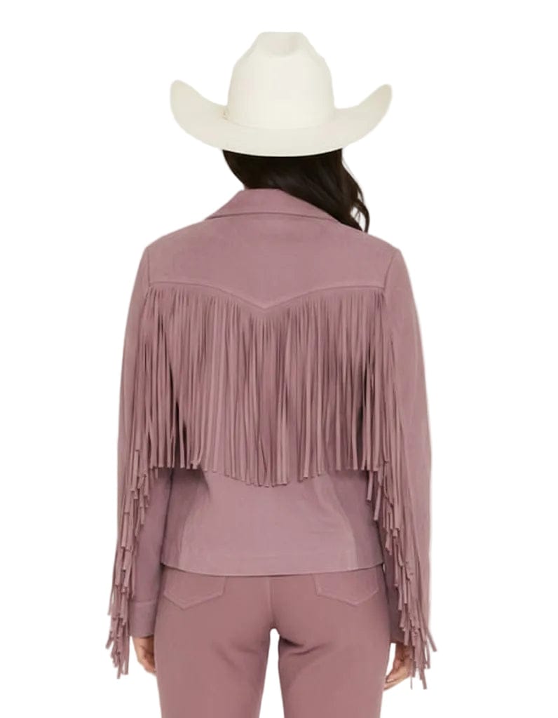 Person wearing a mauve fringe jacket and white cowboy hat on a white background