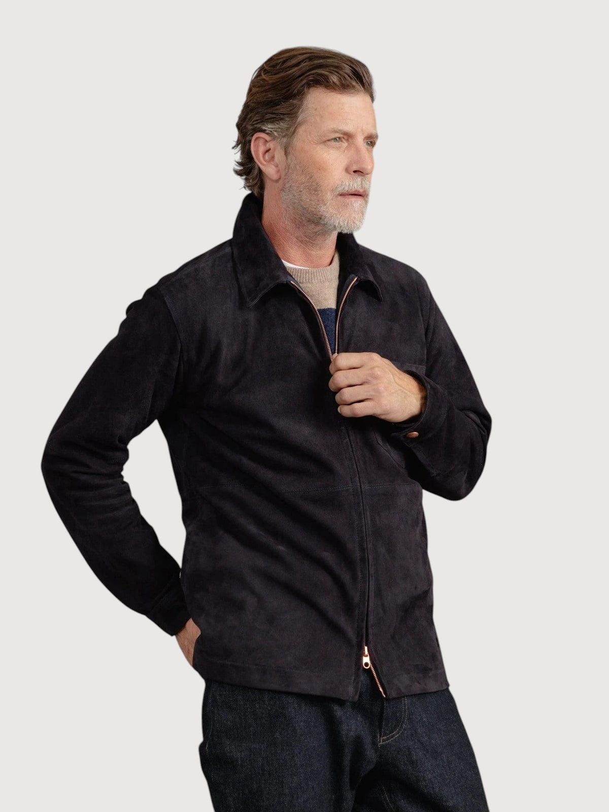Luxequir Vogue Westshore Ink black suede overshirt worn by a man with a collared zip-up front and panel detailing.