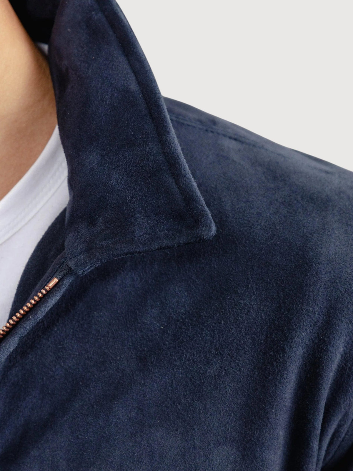 Luxequir Vogue navy blue suede overshirt with a structured collar and metal zipper detail