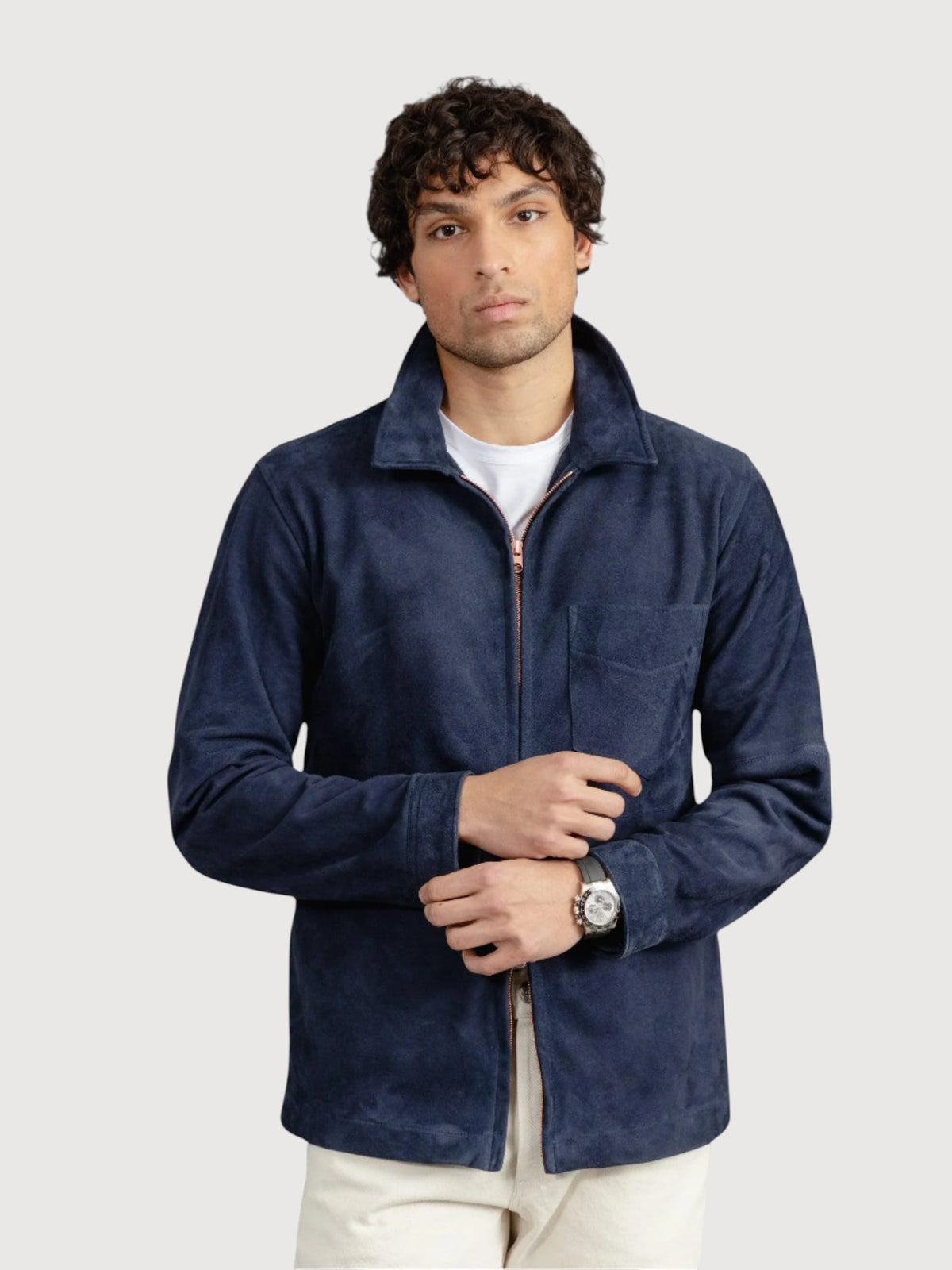Luxequir Vogue navy blue suede panelled overshirt with a front zip closure worn by a man in a regular fit.