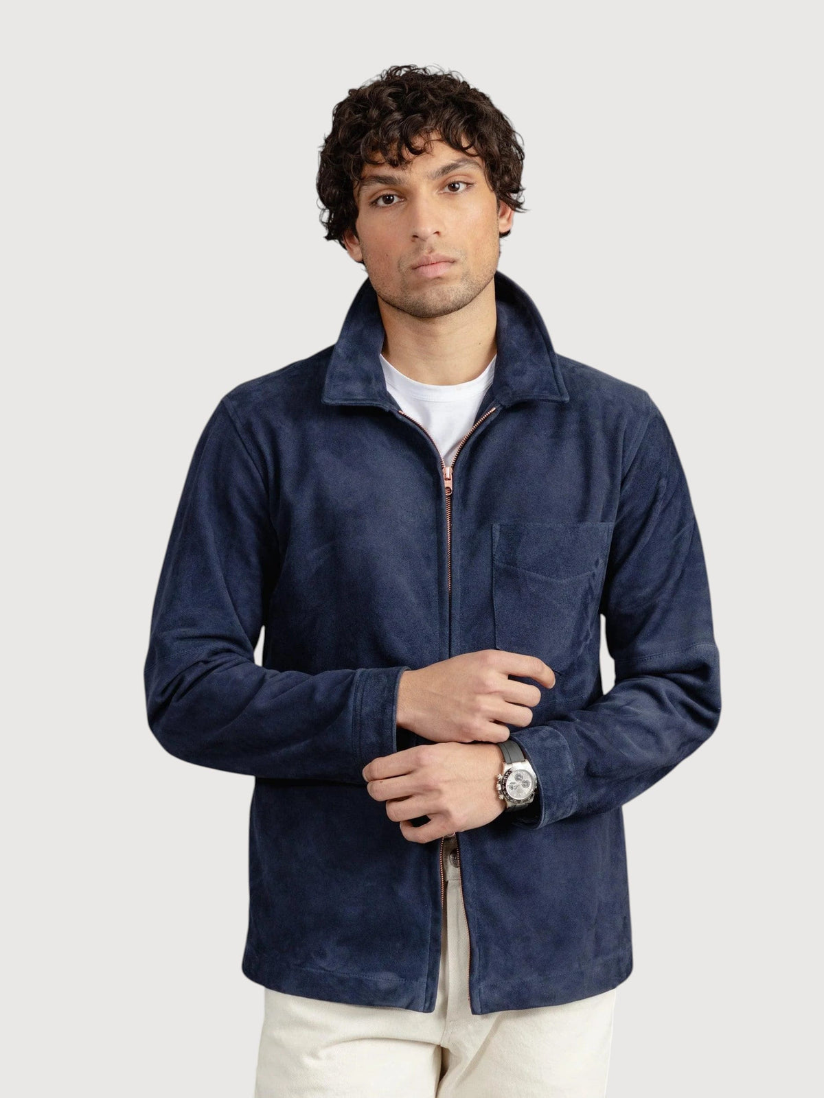 Luxequir Vogue navy blue suede panelled overshirt with a front zip closure worn by a man over a white t-shirt