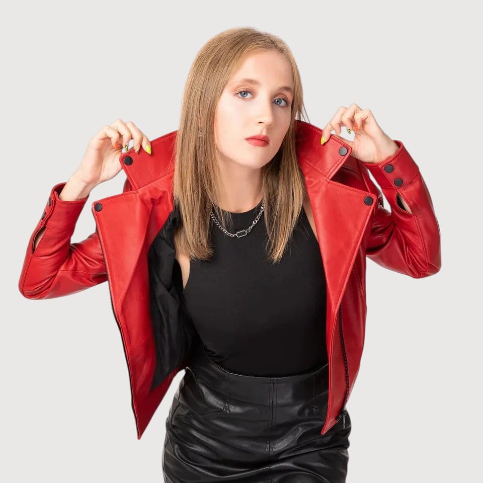 Luxequir Vogue Scarlet Vortex red lambskin leather biker jacket worn by a model with a black top and leather skirt